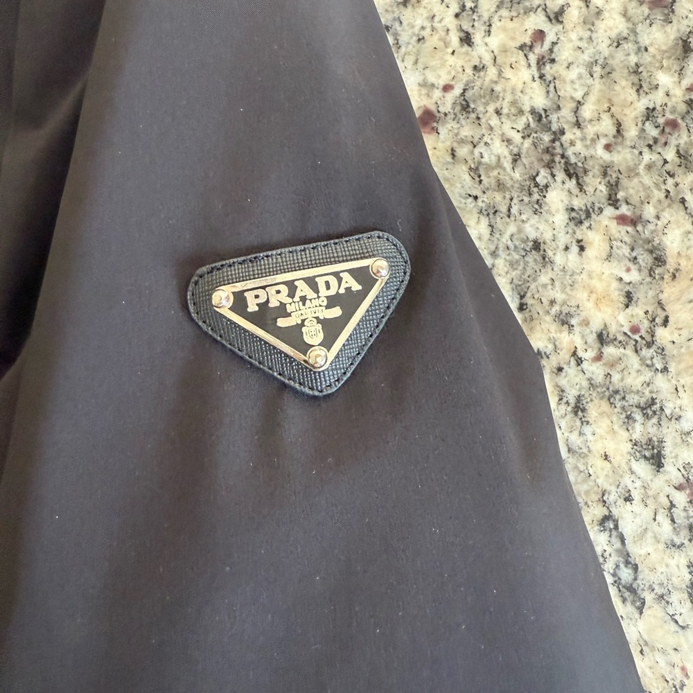 Prada 
women’s size medium 
black winter coat